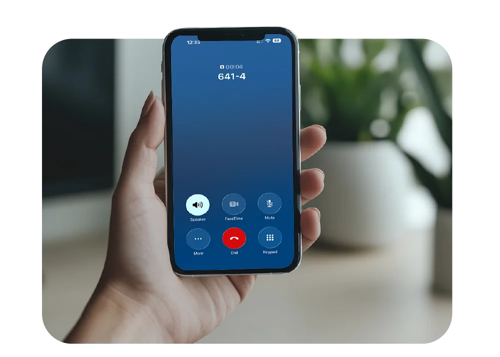 An iPhone showing an active call showing extension dialing